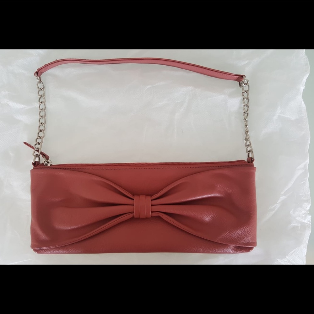 Pink purse with bow from Barney’s